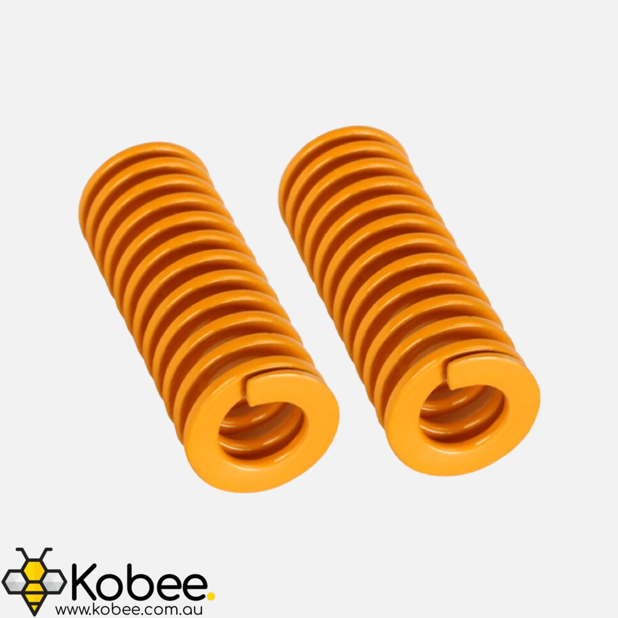 Replacement 3D printer bed springs beside a Creality build plate