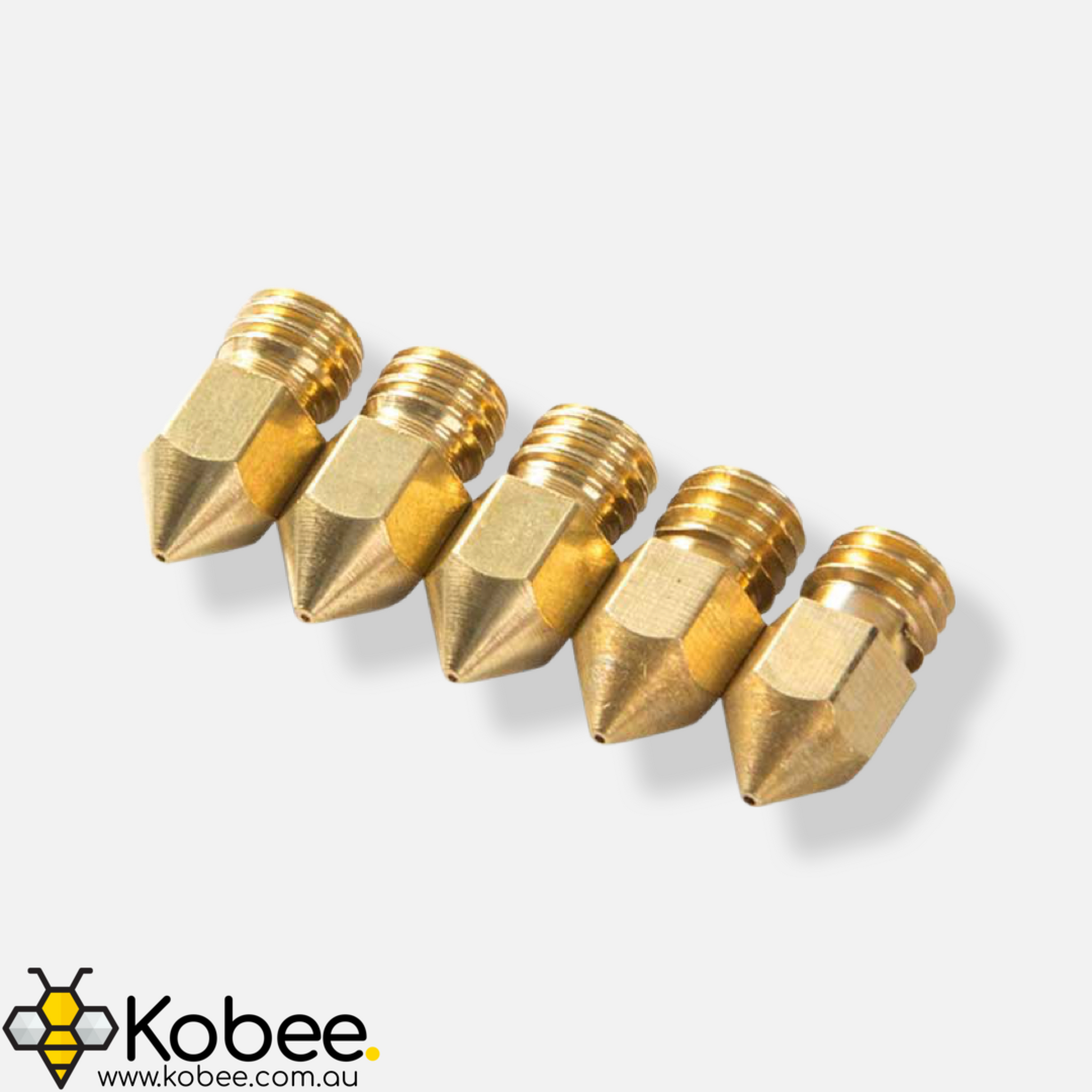 Ender 3 replacement brass nozzle shown beside a 3D printer hot end