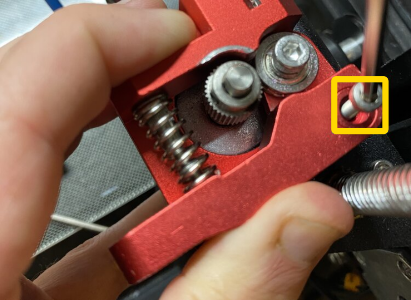 Install the arm and spring